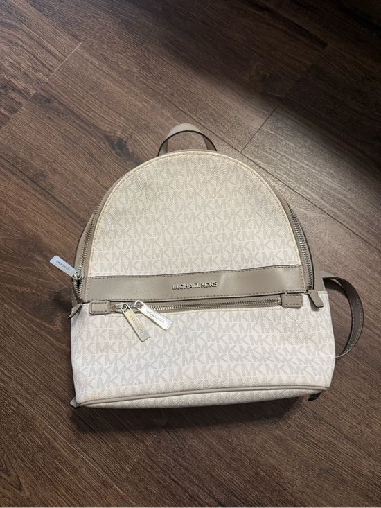 Michael Kors Handbags - Michael Kors White and Taupe Logo Dome Crossbody Backpack